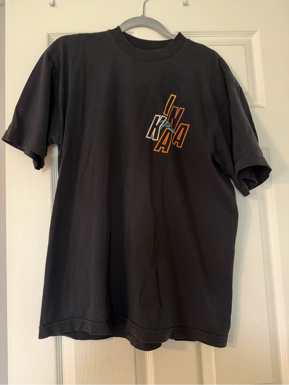 Inaka Power Black Short-Sleeve Tee with Multicolor Chest Graphic